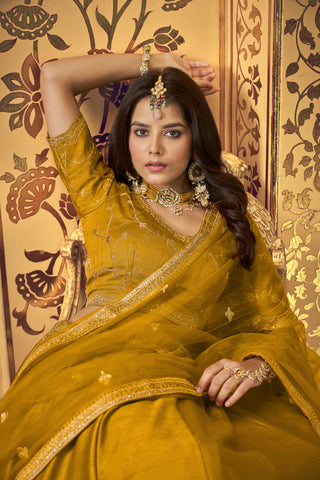 Yellow Hand Work, Zari & Sequins Embroidery Kumkum Silk Blouse with Lino Silk & Nylon Satin Lehenga & Heavy Net Dupatta Set