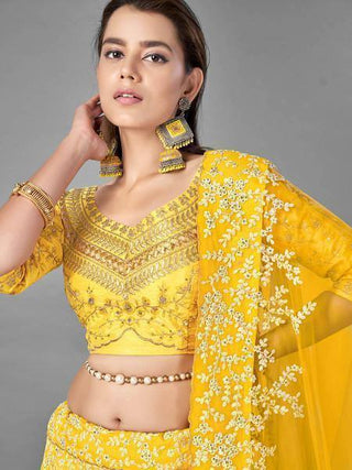Yellow Heavy Embroidered Art Silk bridal Lehenga - Ria Fashions
