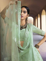 Green Heavy Embroidered Soft Net bridal Lehenga - Ria Fashions