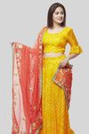 Yellow Bandhej Ruffle Silk Lehenga Choli with Peach Gotta Embroidered Georgette Dupatta - Ria Fashions