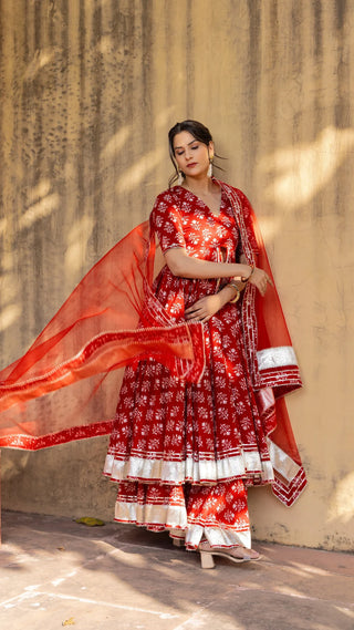 Red Cotton Printed Open Front Anarkali Style Kurta Teamed with Flared Skirt and a Soft Net Dupatta