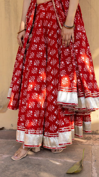 Red Cotton Printed Open Front Anarkali Style Kurta Teamed with Flared Skirt and a Soft Net Dupatta